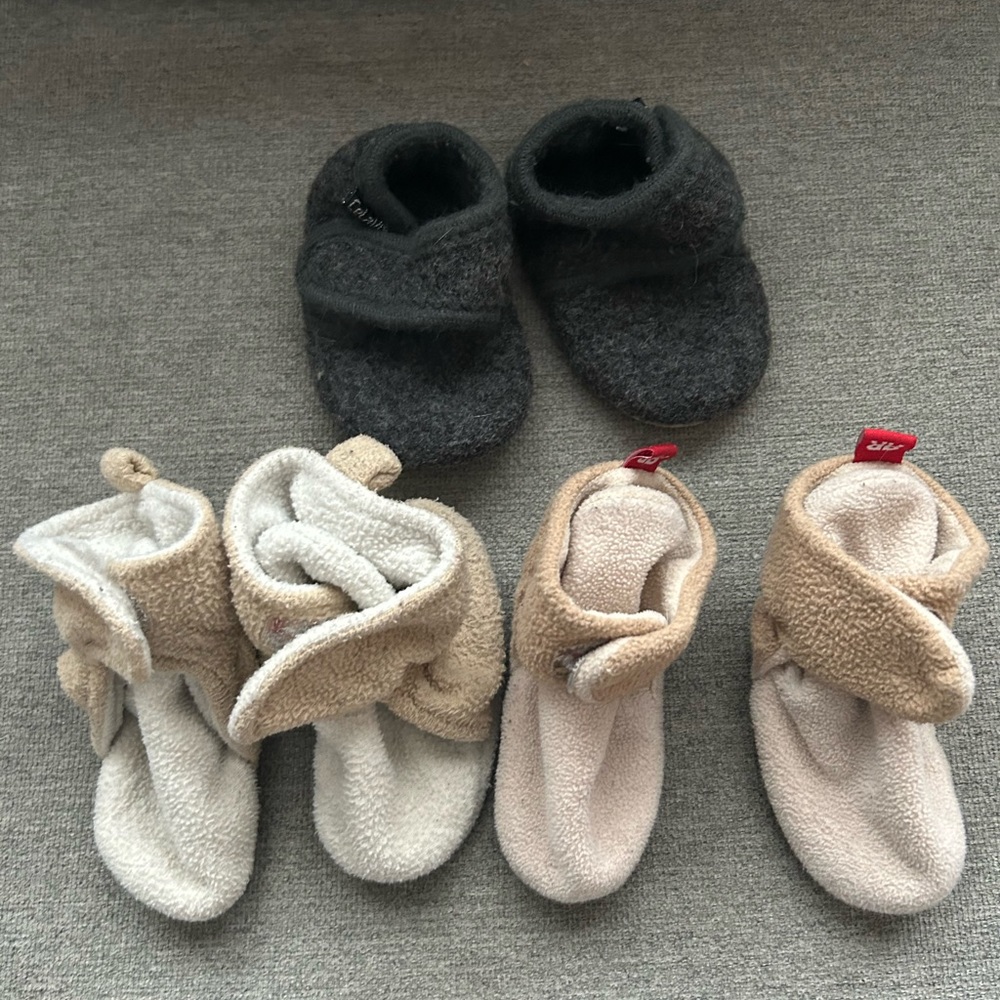 Three pairs of baby booties